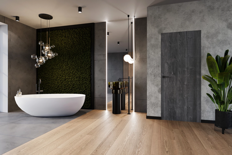 In die Wand integrierte Innentür aus Altholz, mit flächenbündiger Optik und dezenter Maserung – verbindet moderne Architektur mit dem Charme recycelten Holzes.