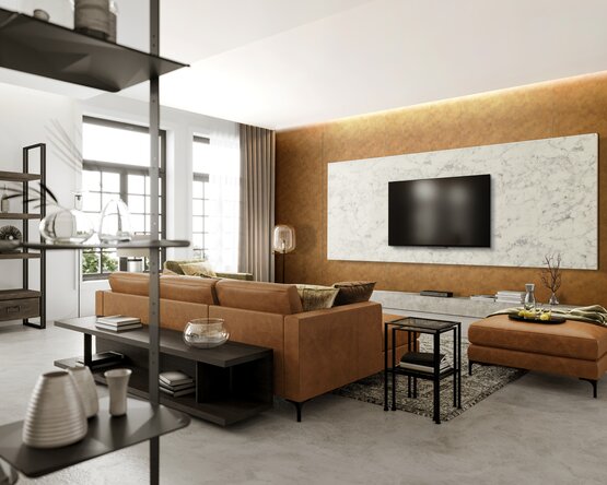 Wohnzimmer mit TV-Wand aus marmorierter SIBU Design-Paneelen und stilvollen Ledermöbeln.