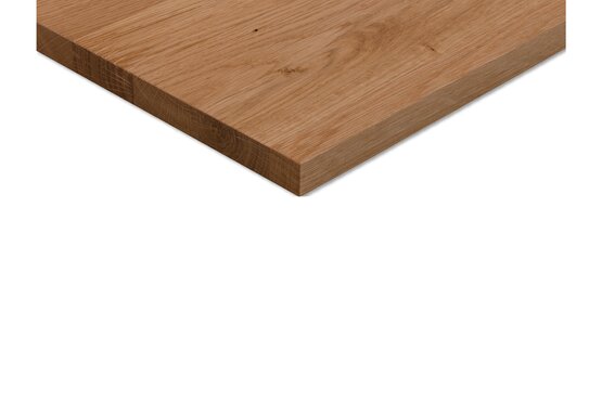 Eine Holzplatte mit natürlicher Oberfläche, aus leicht schräger Perspektive von oben fotografiert – mit sichtbarer Maserung und Farbvariationen.